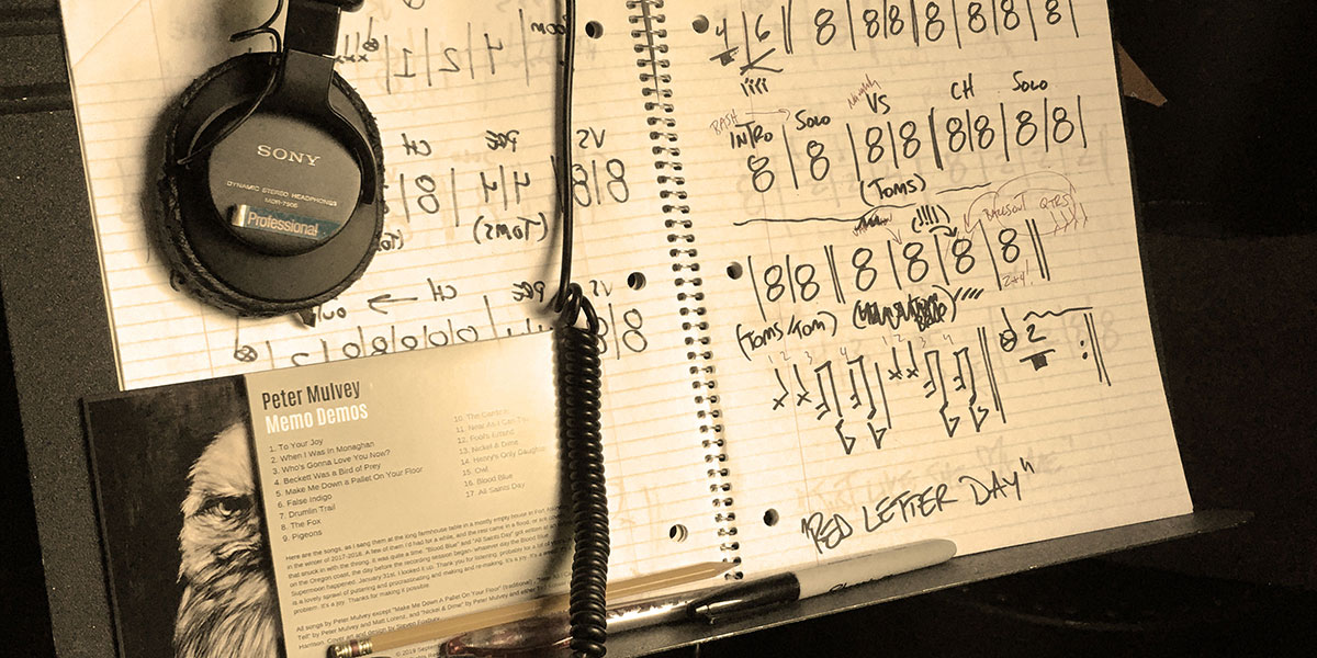 drum charts on a music stand